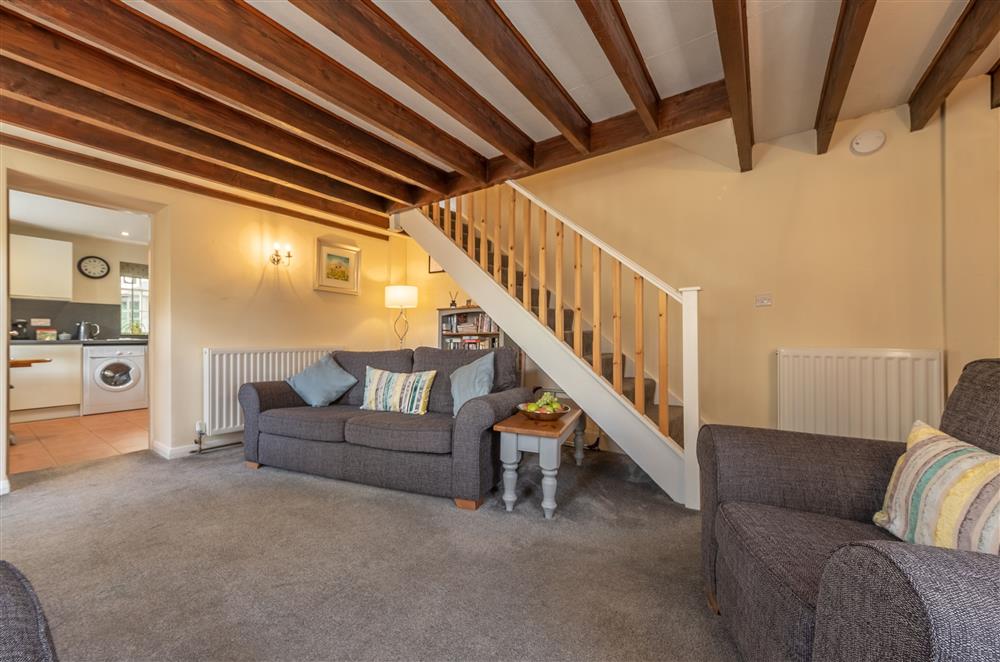 Exposed beams in this delightful cottage at White Rose Cottage, Constable Burton, Leyburn