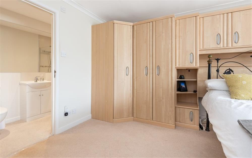 Another view of bedroom two with plenty of built in storage.  at White Rose House in Kingsbridge