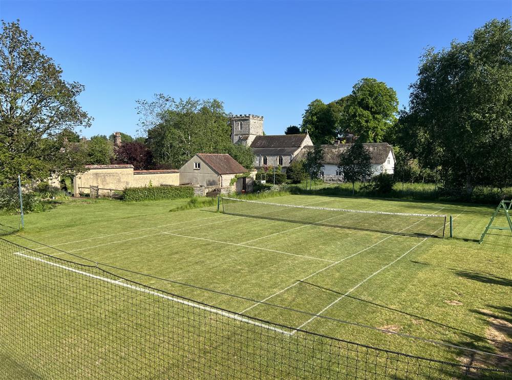 Access to beautiful grass tennis court during your stay at Whitechurch Stables, Winterborne Whitechurch