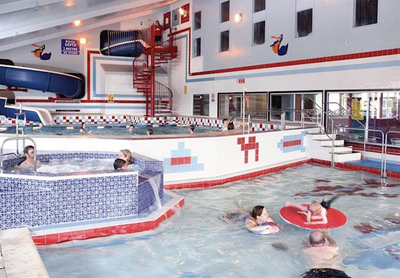 Heated indoor pool and flume at Whitecliff Bay Holiday Park in , Bembridge