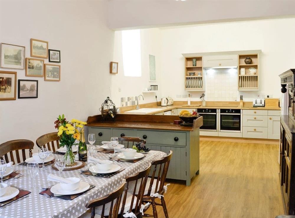 Dining area conveniently adjoins the kitchen at Whitehall in Mealsgate, Cumbria