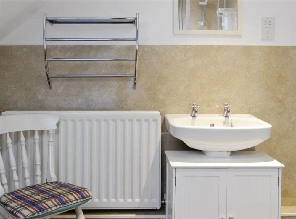 Family bathroom with separate shower cubicle and bath at Whitehall in Mealsgate, Cumbria