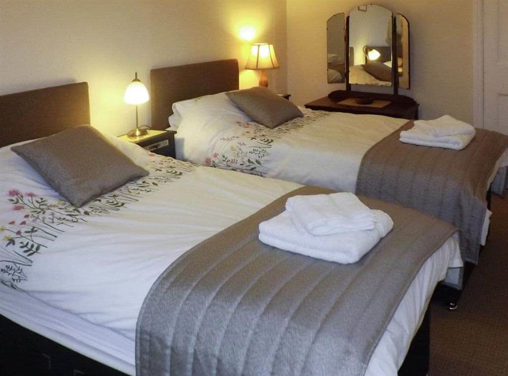 Inviting twin bedroom at Whitehall in Mealsgate, Cumbria