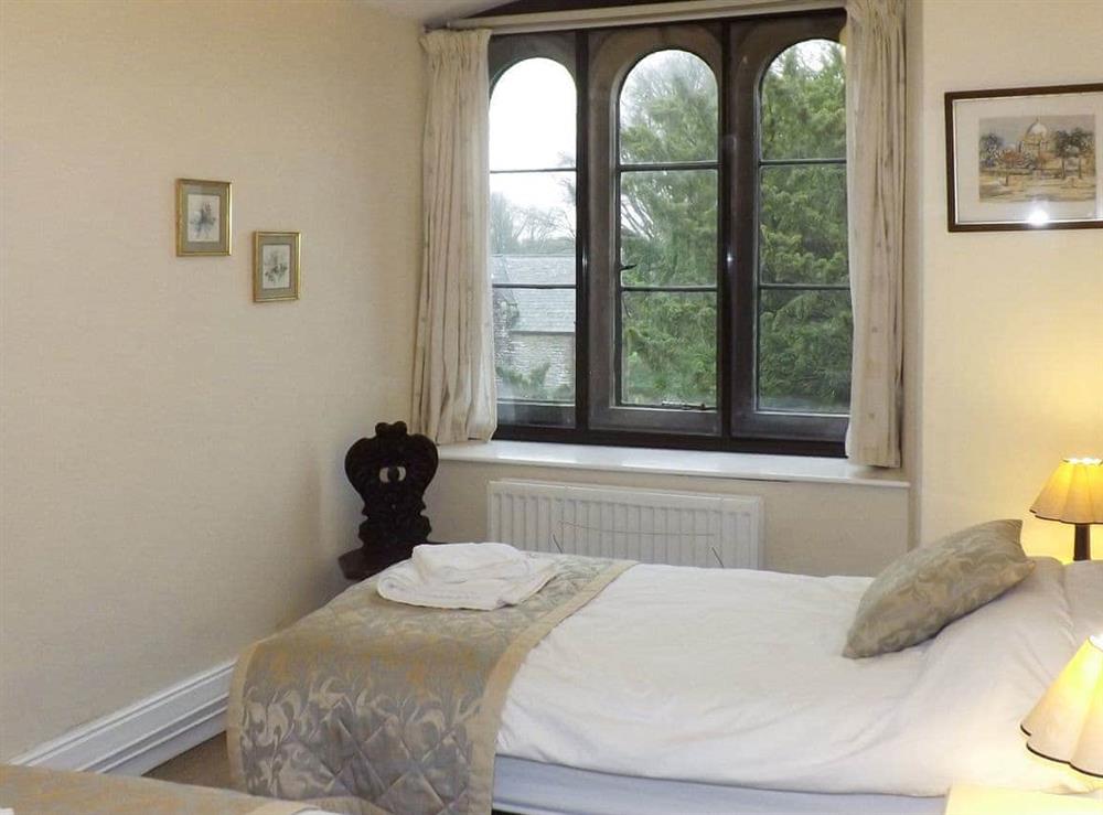 Light and airy twin bedroom at Whitehall in Mealsgate, Cumbria