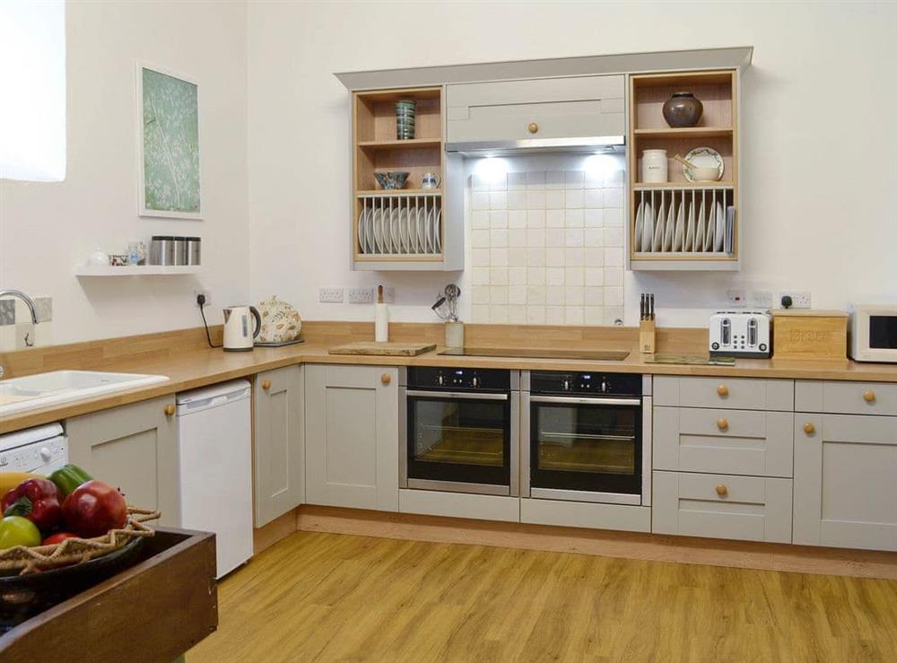 Well-equipped fitted kitchen at Whitehall in Mealsgate, Cumbria