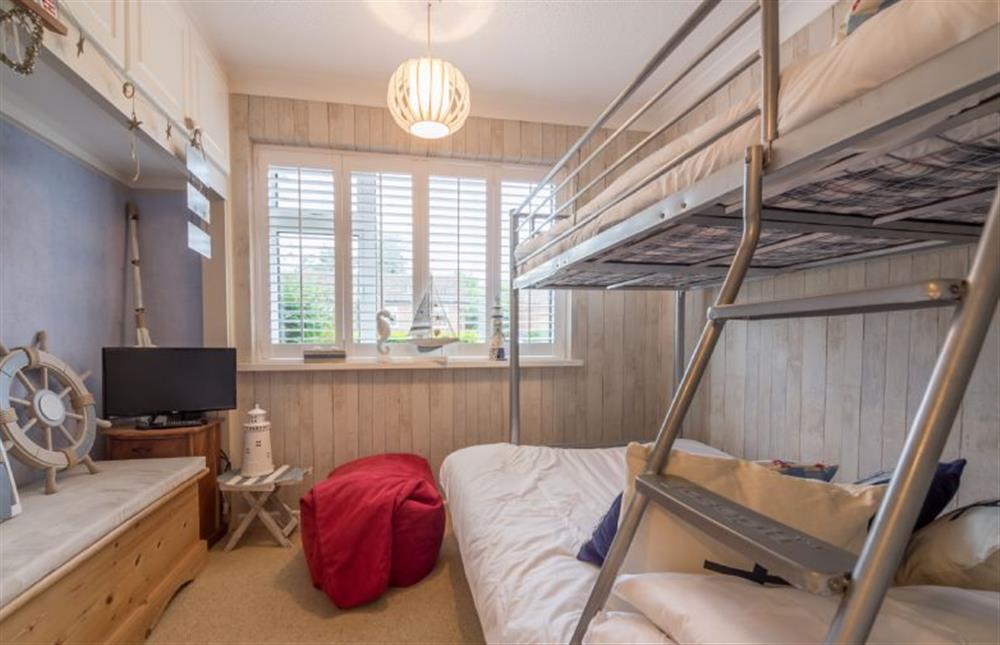 Ground floor: Bedroom three is decorated with a nautical theme at Whitehaven, Brancaster near Kings Lynn