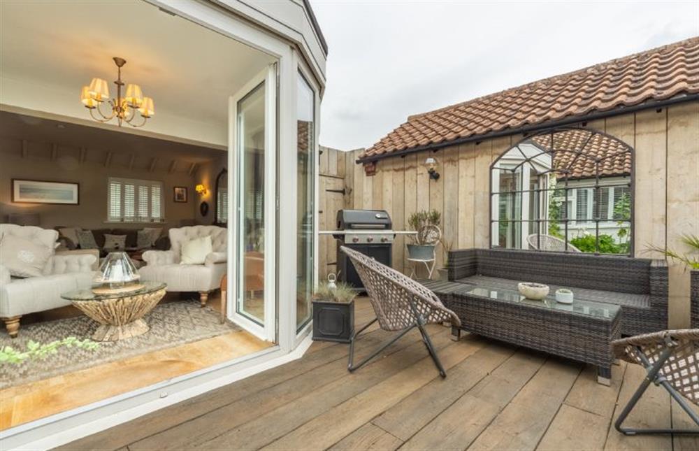 Ground floor: French doors lead out onto the decking area