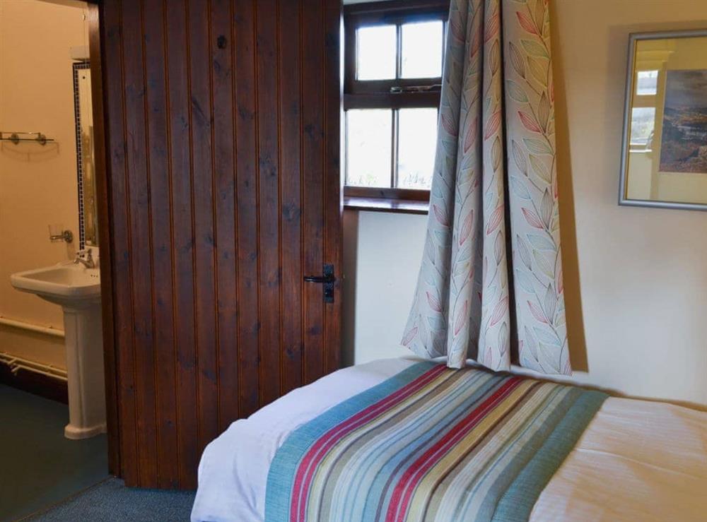 Ground floor twin bedroom (photo 2) at Whitehouse Farm Barn in Heathcote, near Hartington, Derbyshire