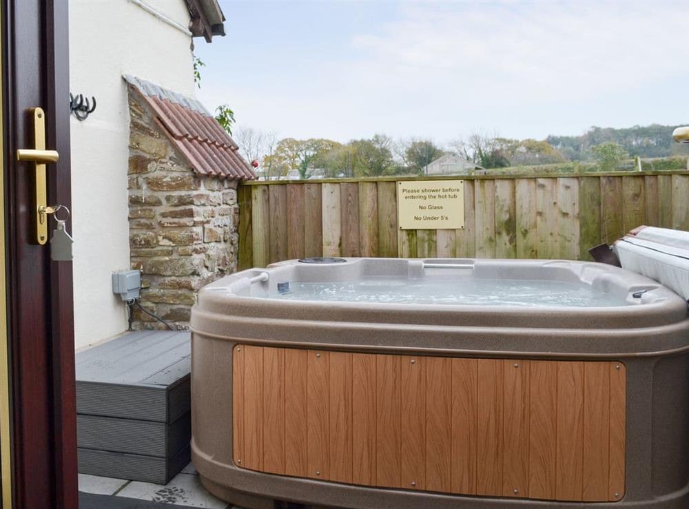 Luxurious hot tub at Tithe Barn, 