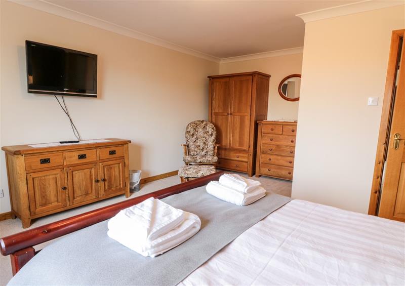 This is a bedroom (photo 2) at Whiteside Cottage, Darvel