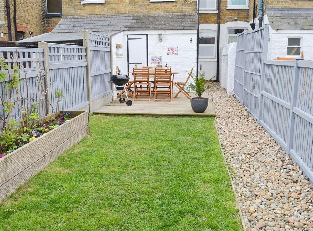 Large lawned garden and ideal decking area at Whitstables Pearl in Whitstable, Kent