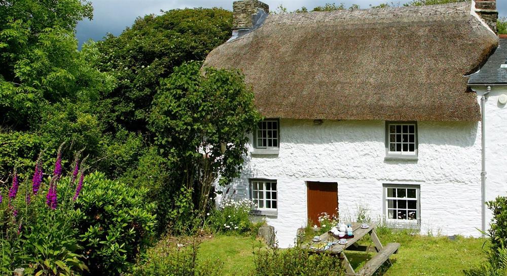 The exterior and garden at Whitstone Cottage in Helston, Cornwall