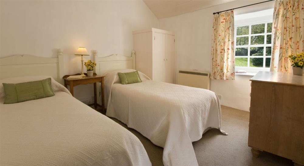The twin bedroom at Whitstone Cottage in Helston, Cornwall