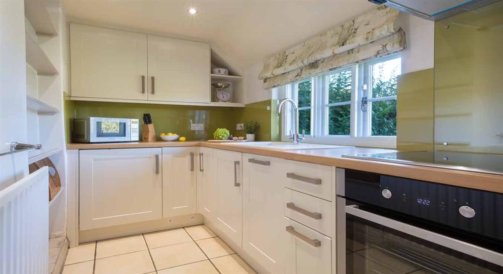 The well-equipped kitchen at Wicket Nook Cottage in Ashby-de-la-zouch, Leicestershire