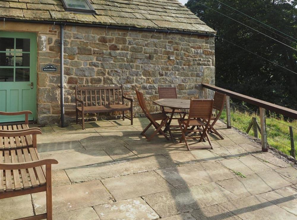 Paved patio with sitting out area and outside eating area at Wickwoods in Wath, near Pateley Bridge, North Yorkshire