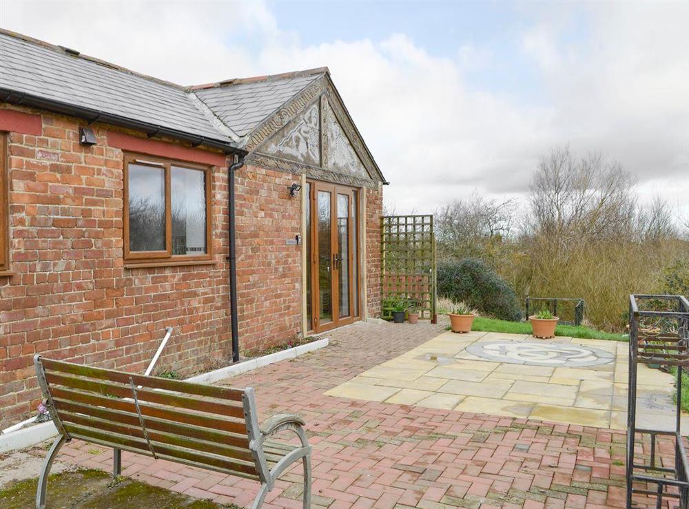 Attractive holiday home with spacious patio at Spindlestone, 