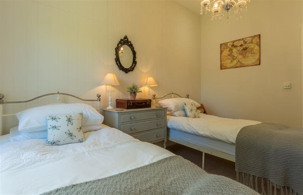 First floor: Bedroom three, full size twin single beds (photo 2) at Wigeon Cottage, Thornham near Hunstanton