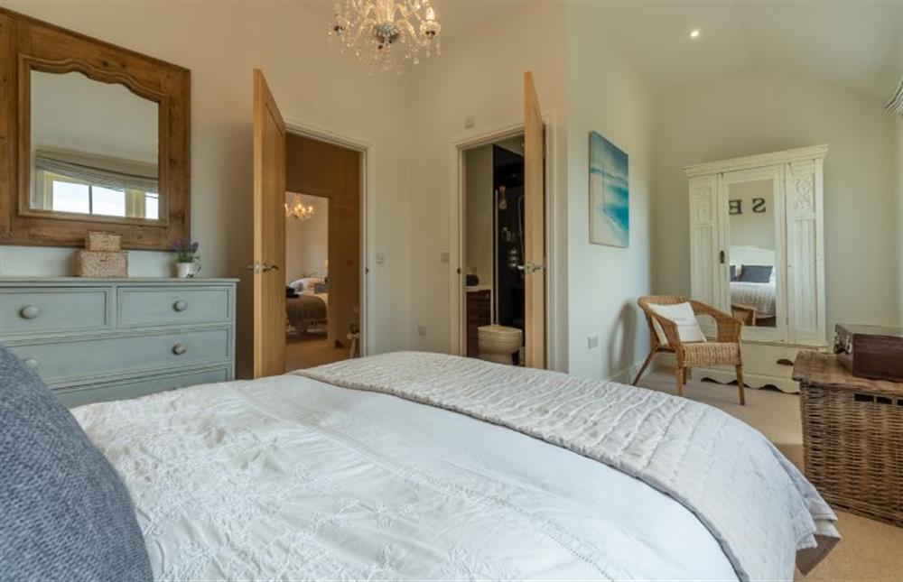First floor: Master bedroom has en-suite shower room (photo 2) at Wigeon Cottage, Thornham near Hunstanton