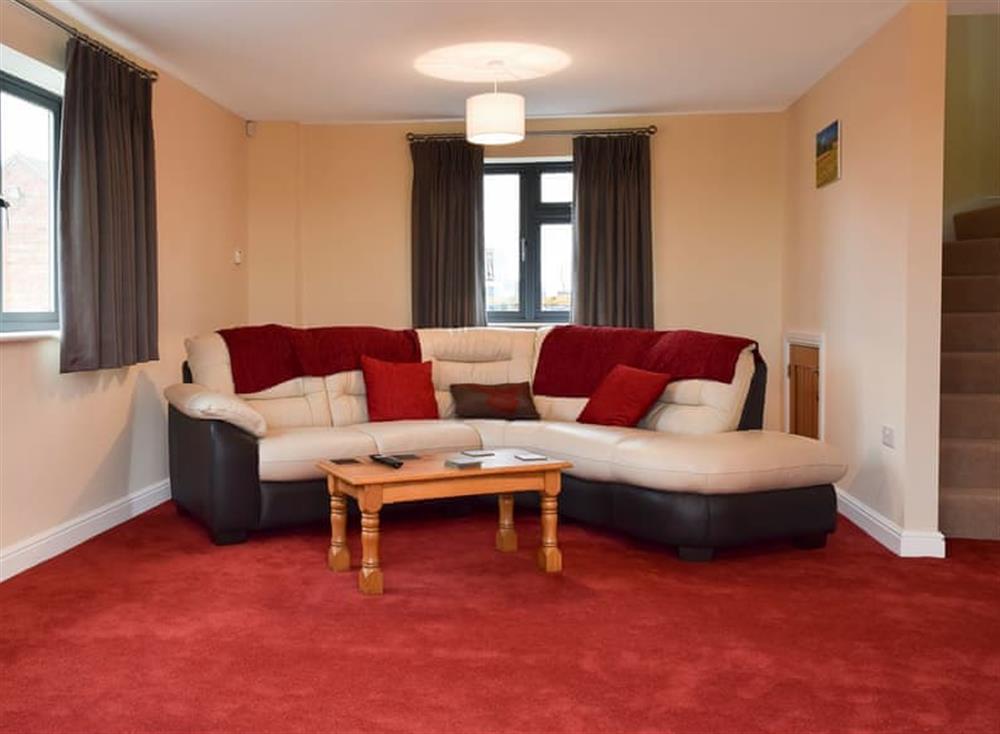 Spacious living room with wood burner (photo 2) at Cornfield View, 