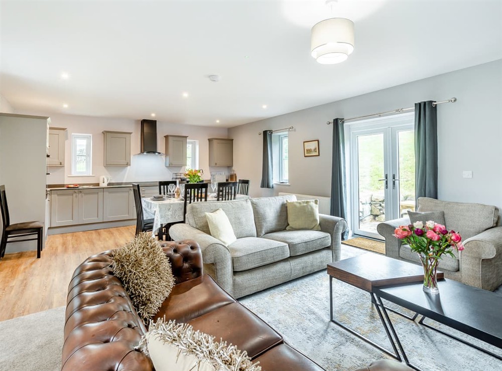 Open plan living space (photo 3) at Wild Boar Cottage in Sedbergh and the Howgill Fells, Cumbria