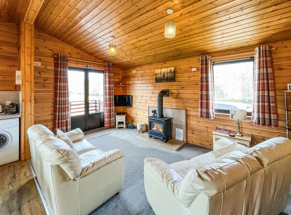 Open plan living space (photo 2) at Wildcat Lodge in Glendrum, Newtonmore, Inverness-Shire