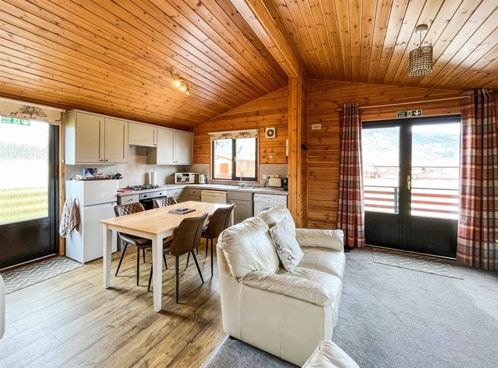 Open plan living space (photo 4) at Wildcat Lodge in Glendrum, Newtonmore, Inverness-Shire