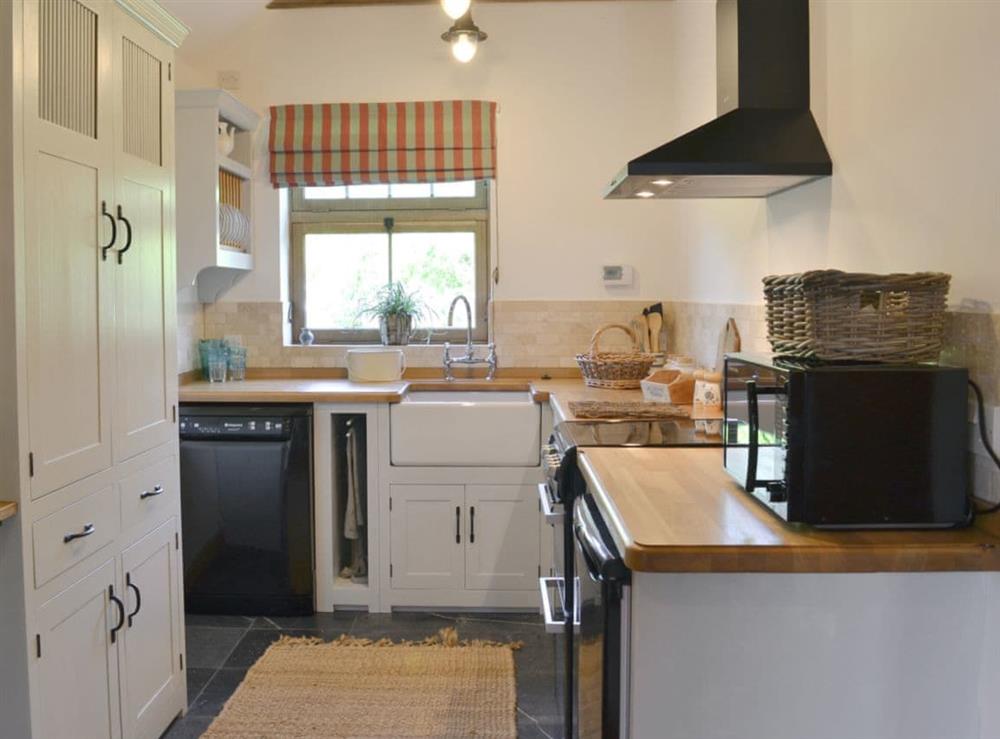 Well equipped kitchen/ dining area (photo 2) at Cowslip Cottage, 