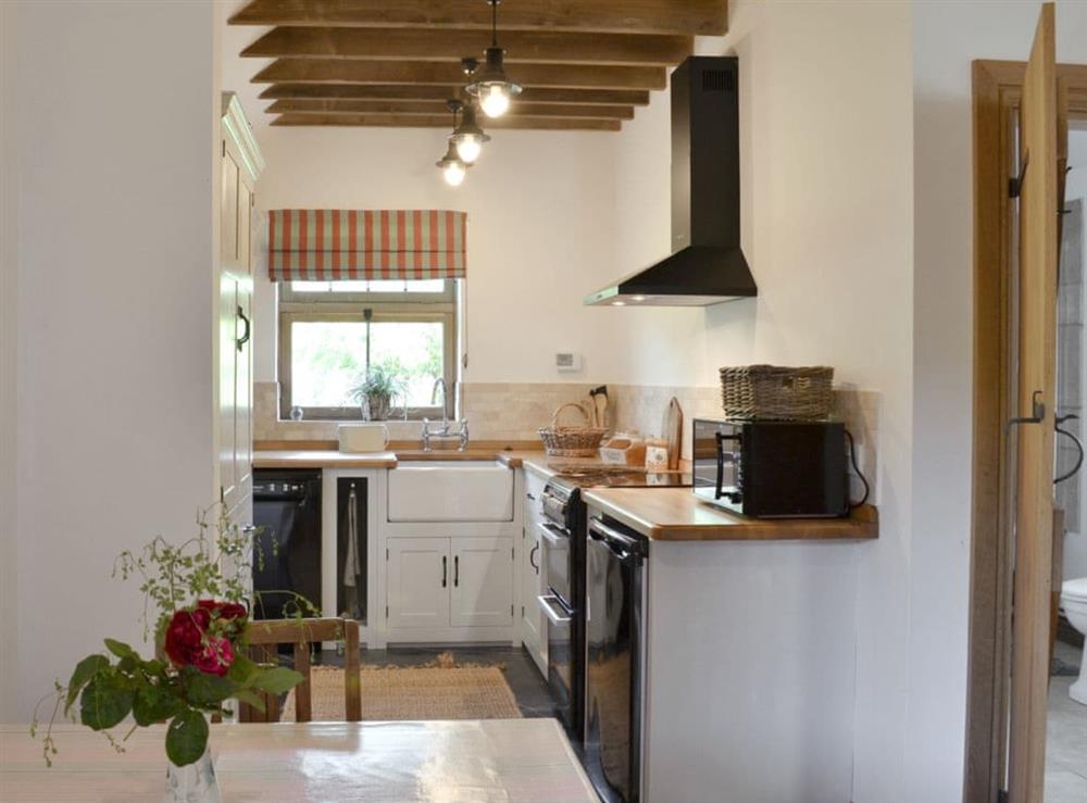 Well equipped kitchen/ dining area at Cowslip Cottage, 