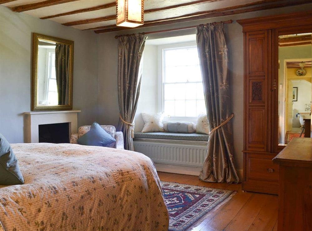 Cosy beamed bedroom with 5ft bed at Wilfin Beck Cottage in Cunsey, Windermere., Cumbria