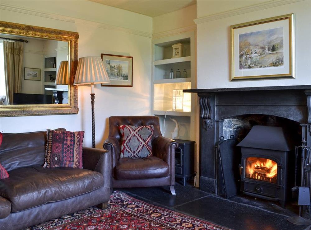 Relax in the warm and cosy living room at Wilfin Beck Cottage in Cunsey, Windermere., Cumbria