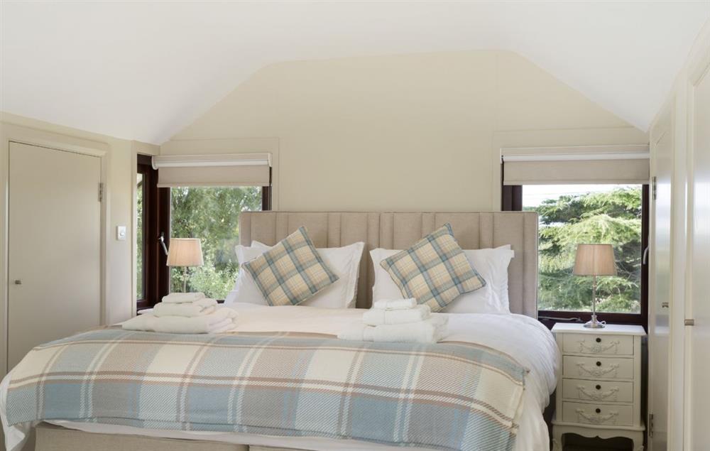 Bedroom three with a super-king size bed which can be converted into two full size single beds on request