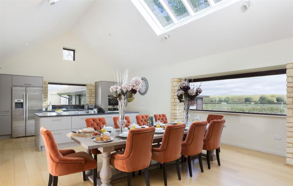 Elegant dining room with breath taking panoramic windows at Willersey Farm House, Willersey
