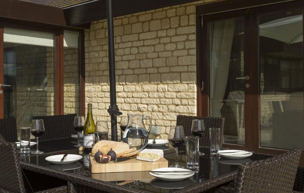Enjoy dining outside al-fresco in this wonderful private space