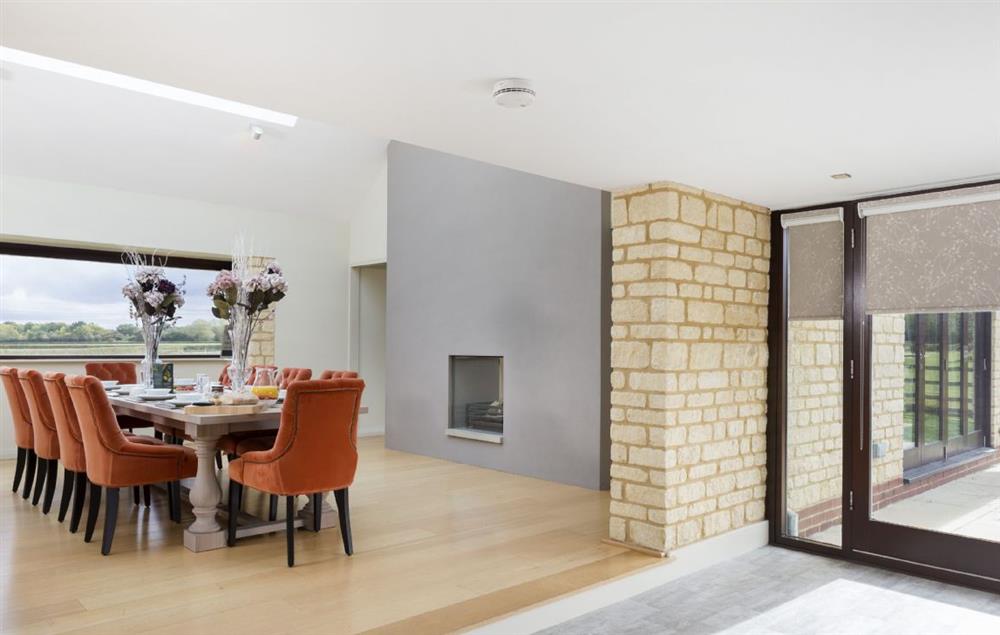 Open-plan walkway with floor to ceiling windows for maximum light at Willersey Farm House, Willersey