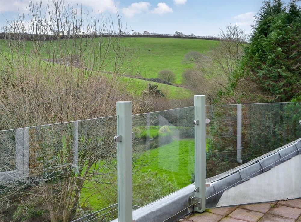 Balcony with countryside views at Willow Barn in Polmassick, near St Austell, Cornwall