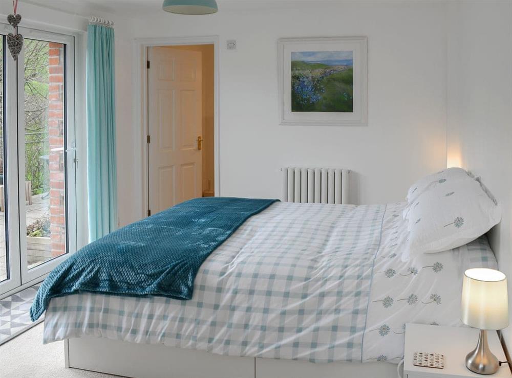 Comfortable double bedroom at Willow Barn in Polmassick, near St Austell, Cornwall