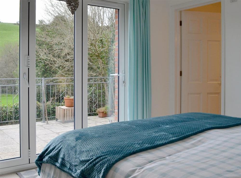 Double bedroom with fantastic views at Willow Barn in Polmassick, near St Austell, Cornwall