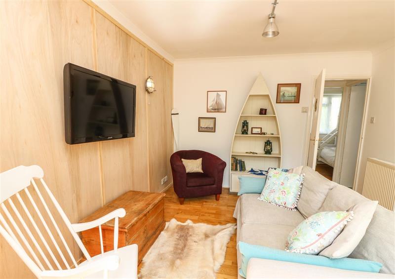 Relax in the living area at Willow Cabin, Cowes