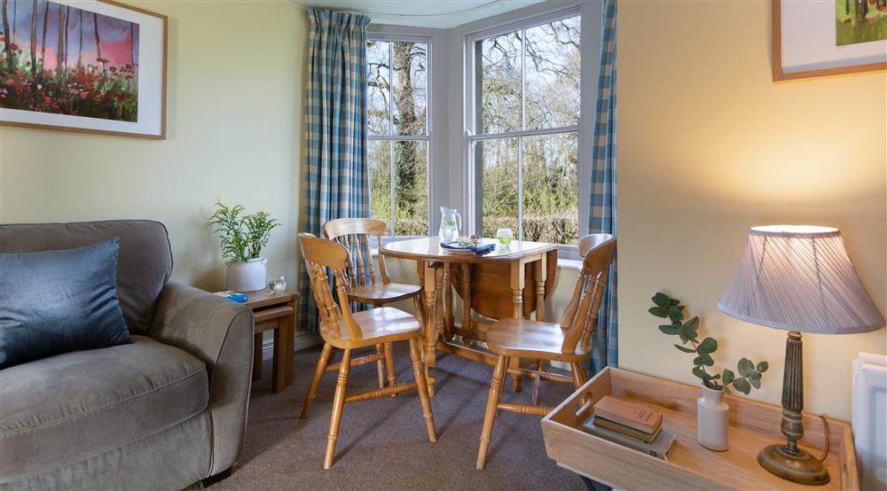 The sitting and dining room (photo 2) at Willow Cottage in County Fermanagh, 