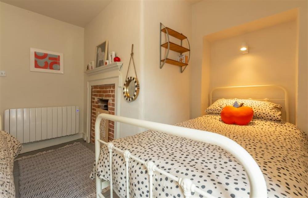 First floor: Bedroom three, twin room at Willow Cottage, North Creake near Fakenham