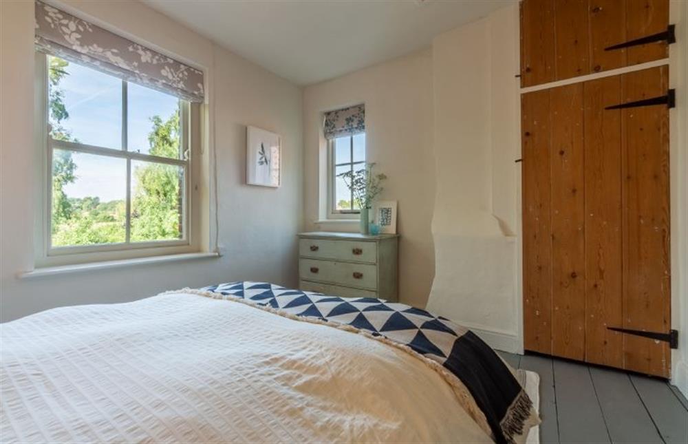 First floor: Light and airy bedroom two at Willow Cottage, North Creake near Fakenham