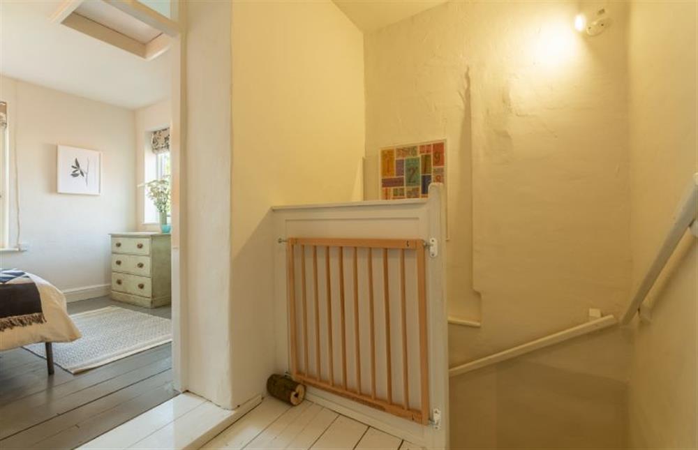 First floor: The landing has a stair gate at Willow Cottage, North Creake near Fakenham