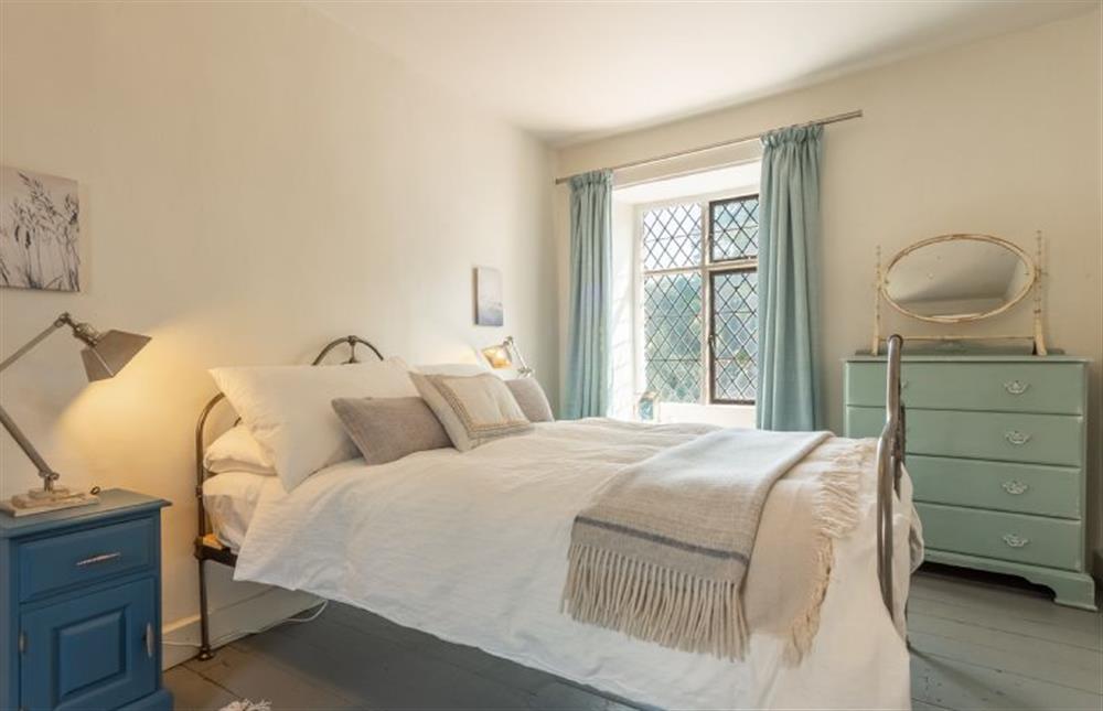 First floor: The master bedroom has a double bed at Willow Cottage, North Creake near Fakenham