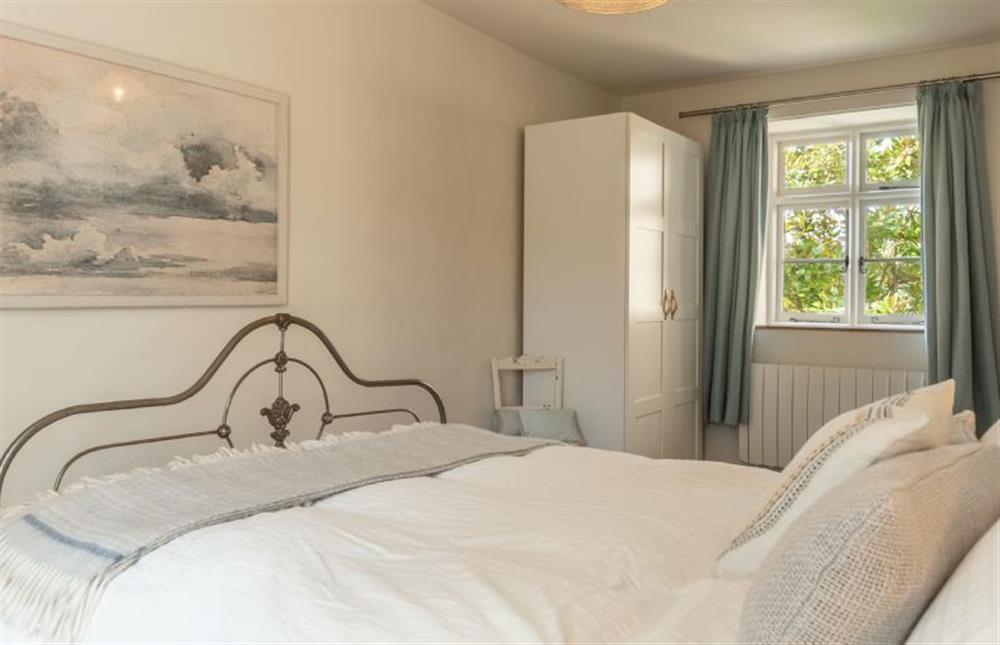 First floor: There is a wardrobe in the master bedroom at Willow Cottage, North Creake near Fakenham