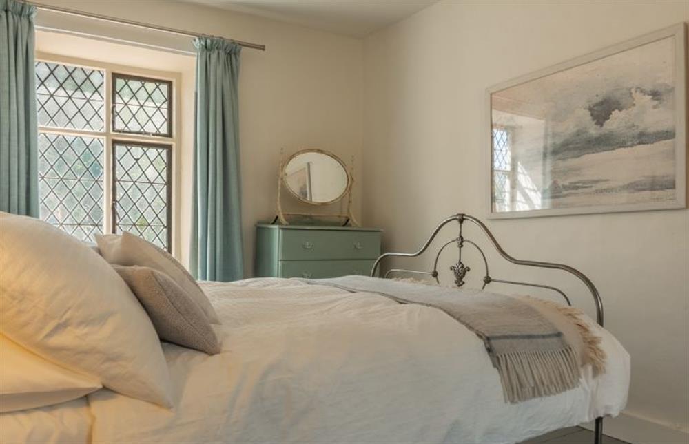 First floor: Understated class in the lovely master bedroom at Willow Cottage, North Creake near Fakenham
