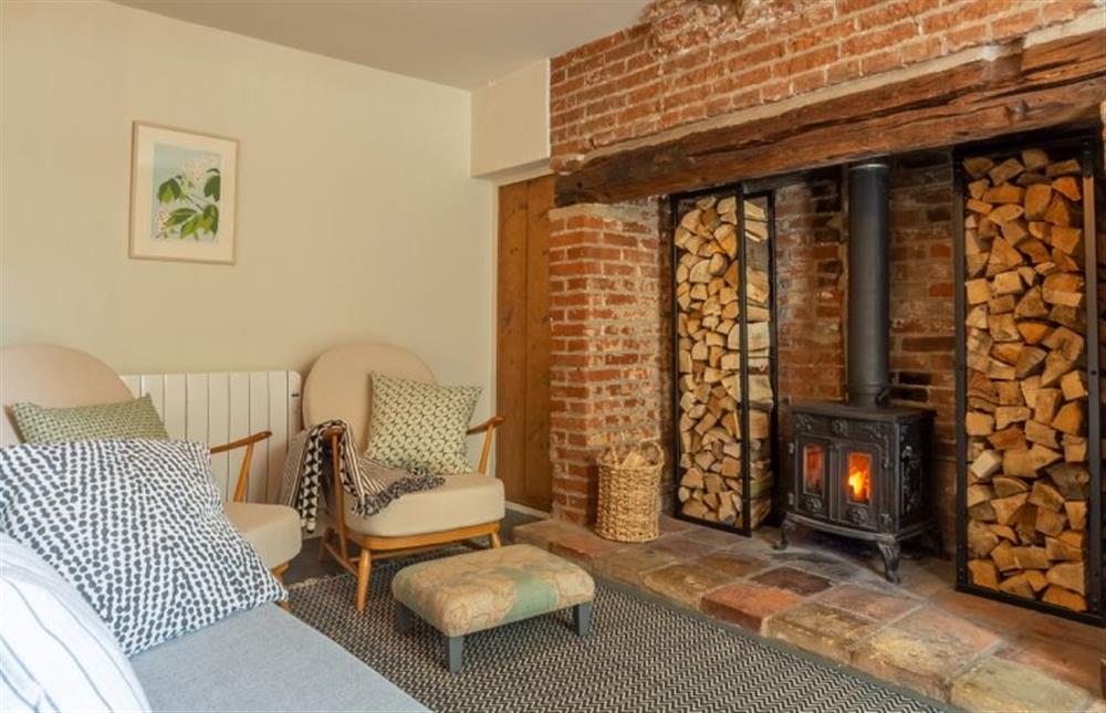 Ground floor: Cosy wood burning stove is the heart of the sitting room at Willow Cottage, North Creake near Fakenham