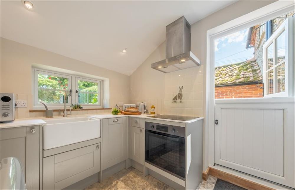 Ground floor: Kitchen with door opening to the garden at Willow Cottage, South Creake near Fakenham