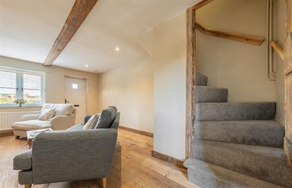 Ground floor: Norfolk winder stairs lead to the first floor at Willow Cottage, South Creake near Fakenham