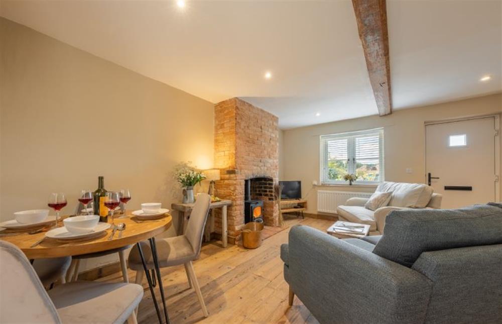 Ground floor: Sitting room with dining area at Willow Cottage, South Creake near Fakenham