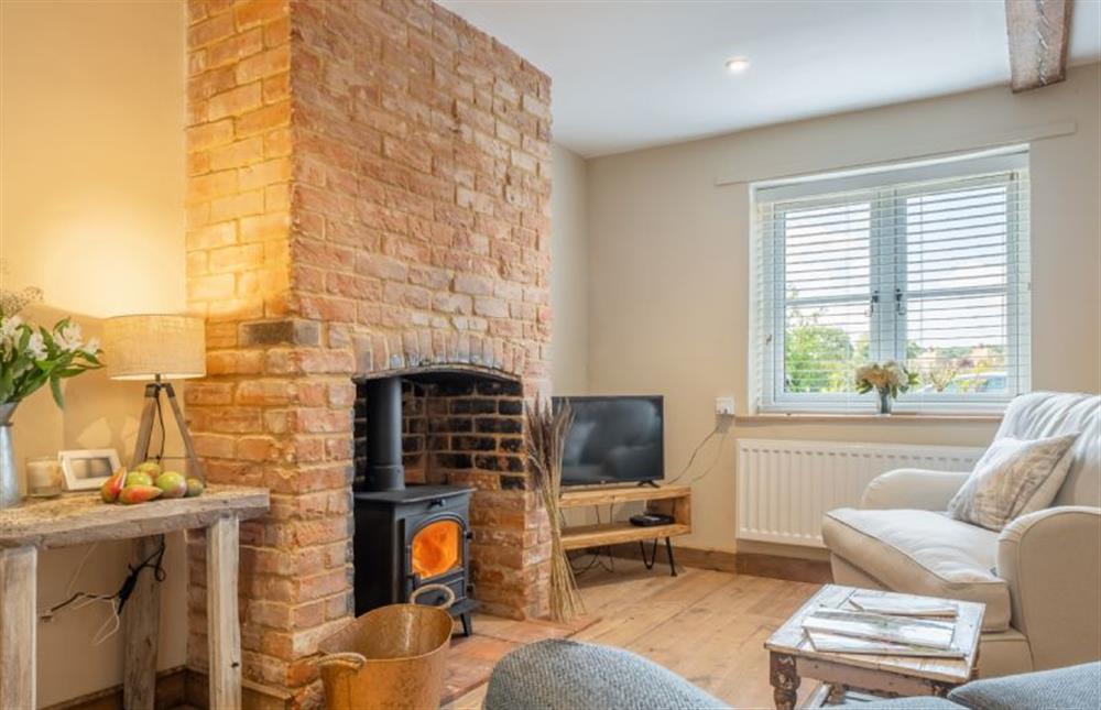 Ground floor: Sitting room with wood burning stove at Willow Cottage, South Creake near Fakenham